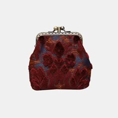 Discover the perfect blend of elegance and functionality with this chic coin purse. Lovingly crafted from rich burnout velvet and adorned with a delightful cotton floral canvas, this vintage-style wallet exudes timeless charm. The brass clasp, featuring a double kiss lock, adds a touch of sophistication to this accessory. Effortlessly secure your belongings while showcasing your impeccable taste. Designed with convenience in mind, this coin purse boasts pockets on both sides of the middle panel. Organize your ID, cards, money, and coins with ease, making it an ideal companion for your daily adventures. Handmade with care, this charming coin purse not only elevates your style but also makes for a thoughtful gift for your loved ones. Surprise them with a touch of vintage luxury they'll cheri Retro Bag With Card Slots, Formal Brown Coin Purse With Removable Pouch, Retro Pouch Clutch For Daily Use, Formal Rectangular Coin Purse With Snap Closure, Elegant Brown Coin Purse, Vintage Bags With Coin Pocket, Vintage Coin Purse For Everyday Use, Retro Coin Purse With Coin Pocket For Daily Use, Vintage Travel Wallets In Pouch Shape