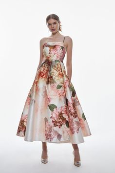 Revitalise your formalwear collection in this joy-infused floral dress. An elegant photographic floral print lends romantic allure to this piece, while a flared maxi dress add a dramatic mood. Style this dress with a pointed heels and accessories for an unforgettable evening look.Photographic floral printCami strapsA-line skirtMaxi hemlineFrom wedding guest dresses to mother of the bride outfits, discover our new season formalwear collection. Floral Mother Of The Groom Dresses, Elegant A-line Evening Dress With Floral Print, Elegant A-line Floral Evening Dress, Floral Print A-line Midi Dress For Wedding Guest, Elegant Floral Print Tea-length Midi Dress, Elegant Tea Length Floral Midi Dress, Elegant Floral Tea-length Dress, Feminine A-line Midi Dress For Prom, Elegant Floral Print Midi Dress With Fitted Bodice