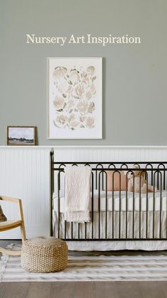 a baby crib in the corner of a room with a painting on the wall