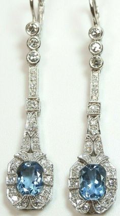 ART DECO SANTA MARIA NATURAL AQUAMARINE + DIAMOND EARRINGS (See Video Below) {International Buyers Are Responsible For Customs & Duty Fees} Circa ~ 1930'S 2 ~ Natural Aquamarines Shape ~ Oval Color ~ Medium - Dark Blue 1 ~ 8.12 MM x 6.10 MM x 3.91 MM (1.11 Carat) 1 ~ 8.02 MM x 6.10 MM x 3.65 MM (1.07 Carat Size ~ 2.18 Carat Total Weight Country Of Origin ~ Brazil (Santa Maria Mines) 56 ~ Round Single Cut Natural Diamonds Total Weight ~ 1.10 Carat Color ~ F - G Clarity ~ VS 1 - VS 2 Overall Lengt Diamond Color Grade, Deco Vintage, Vintage Santa, Royal Jewelry, Deco Jewelry, Antique Art Deco, Natural Aquamarine, Art Deco Jewelry, Vintage Santas