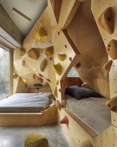 a bedroom with climbing walls and bed in it