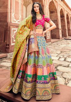 Banarasi silk a line lehenga choli in Beige colour 10198  Desc:  Style : A Line Lehenga Choli Color : Beige   Magenta Fabric : Banarasi Silk Work : Embroidery Wash Care : Dry clean Sleeve Style : Half Sleeve Long Sleeves : Done only in Custom Stitch Sleeves Lining : Done only in Custom Stitch Bust Size : 32 to 42 Inches Occasion : Wedding   Sangeet   Engagement   Reception   Ceremonial   Navratri   Baby Shower. With Express Free Shipping and Custom Stitching, Buy Indian Party wedding wear bridal Multicolor Lehenga, Anarkali Lehenga Gowns, Engagement Lehenga, Bridal Lehenga Online, Indian Wedding Sarees, Navratri Dress, Sabyasachi Lehenga, Reception Lehenga, Anarkali Lehenga