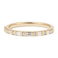 Natural diamonds in alternating round and baguette shapes give this 14-karat yellow gold band an Art Deco-inspired look. It makes a beautiful wedding band  anniversary gift  or daily accessory. Yellow Gold Baguette Wedding Band, Plain Gold Wedding Bands, Baguette Wedding Band, Baguette Band, Beautiful Wedding Bands, Art Deco Wedding Band, Classic Wedding Band, Put A Ring On It, Art Deco Inspired