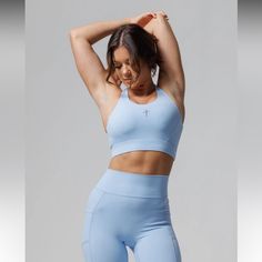 Padded Inserts That Are Removable Blue Compression Sports Bra With Built-in Bra, Blue High Stretch Sports Bra With Built-in Padding, Blue Stretch Sports Bra With Built-in Padding, Functional Blue Sports Bra With Built-in Bra, Fitted Functional Blue Sports Bra, Functional Fitted Blue Sports Bra, Blue Compressive Sports Bra For Sports, Fitted Blue Sports Bra For Pilates, Blue Compressive Sports Bra With Built-in Padding