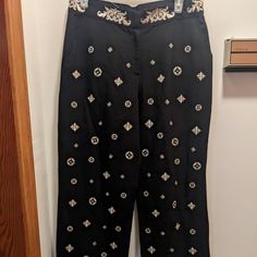 Beautiful Linen Blend Pants With Gold Embroidered Diamond Patterns And Accented Waist. Black Color. Black Embroidered Straight Leg Pants, Embroidered Wide Leg Workwear Bottoms, Embroidered Straight Pants For Workwear, Elegant Embroidered Black Bottoms, Elegant Black Embroidered Bottoms, Elegant Black Bottoms With Floral Embroidery, Black Embroidered Wide-leg Bottoms, Black Embroidered Wide Leg Bottoms, Embroidered Trousers For Work