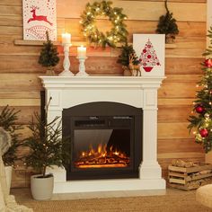 a fireplace in a living room decorated for christmas