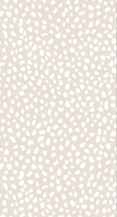 an animal print pattern with white spots on a light beige background, suitable for wallpaper