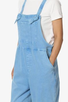 Embrace everyday chic with these denim overalls that blend utility and style. Their adjustable straps and relaxed fit ensure all-day comfort, perfect for casual outings.Made with a soft cotton blend and durable twill, these versatile one-piece jumpsuits are a wardrobe staple for any season.The cropped tapered legs and bib pocket add a contemporary touch to the timeless design, while slant pockets merge convenience with streetwear vibes.Ideal for casual travel, weekend wear, or special occasions, Everyday Chic, Sand Beige, Washed Denim, Weekend Wear, Denim Overalls, Denim Wash, Tapered Legs, Casual Look, Wardrobe Staples