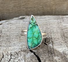 Polished Chrysoprase Ring Jewelry, Sterling Silver Teardrop Opal Ring, Sterling Silver Opal Cabochon Ring, Teardrop Opal Ring In Sterling Silver, Elegant Teardrop Opal Ring In Sterling Silver, Iridescent Opal Cabochon Jewelry, Unique Green Sterling Silver Opal Ring, Iridescent Opal Jewelry For Anniversary, Turquoise Sterling Silver Opal Ring Gift