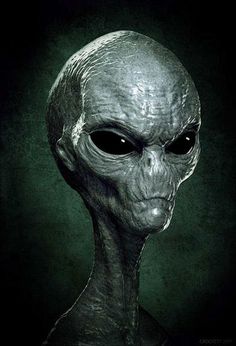 an alien head is shown in this black and white photo, with the dark green background