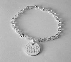 Custom Engraved Monogram or Initial Bracelet Personalized Sterling Silver Petite Round Disc 7" Lengt Engraved Silver Chain Bracelet, Adjustable Silver Name Bracelet With Polished Finish, Silver Name Bracelet With Polished Finish As Gift, Silver Name Bracelet With Polished Finish, Classic Round Charm Bracelet With Polished Finish, Personalized Silver Oval Link Chain Bracelet, White Gold Sterling Silver Name Bracelet With Engraving, Stamped Silver Round Disc Jewelry, Sterling Silver Round Stamped Bracelet