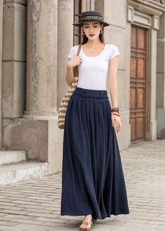 "Get dressed and out of the door in classic good looks with this pleated Long maxi skirt, crafted with soft cotton linen fabric, featuring pleated waist detail and two big pockets. DETAIL * 50% linen, 50% cotton * Has no lining, Not see through * Pleated around waist * Two side seam pockets * Belt loops on waistband * Right Side zipper closure * Perfect for spring and summer, spring, autumn * Need Help how to select the size, Just Leave Your usual wear size Height Weight Waist Hips SIZE GUIDE Si Spring Cotton Maxi Skirt With Pockets, Summer Pleated Maxi Length Bottoms, Summer Maxi Length Pleated Bottoms, Cotton Maxi Skirt With Pockets For Spring, Summer Pleated Maxi Bottoms, Summer Pleated Hem Flared Maxi Skirt, Summer Pleated Waist Maxi Skirt, Summer Solid Color Maxi Skirt With Pleated Waist, Summer Flared Maxi Skirt With Pleated Hem