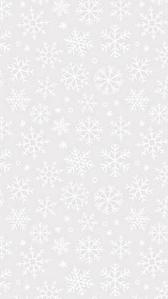 white snowflakes on a light gray background