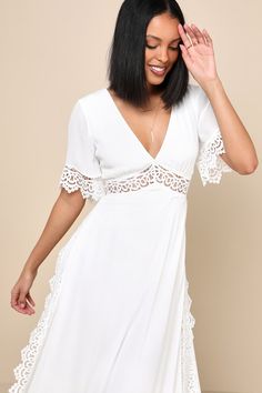 No matter the event, you'll look stunning in the Lulus Sweeten the Occasion White Lace Short Sleeve Maxi Dress! Gauzy, crinkle woven fabric shapes this splendid dress that has a deep V-neckline, flowy short sleeves, and a fitted bodice. An empire waist cascades into a maxi skirt with slits along both sides. Gorgeous sheer crochet lace accents the sleeves, waist, and sides of the skirt. Keyhole with top button closure and hidden zipper/clasp at back. Fit: This garment runs large - please size dow Chic V-neck Midi Dress With Lace Trim, Elegant Fitted V-neck Dress For Vacation, Flowy V-neck Dress With Surplice Neckline For Date Night, Flowy V-neck Midi Dress With Lace Trim, Beach V-neck Lace Dress, Lace V-neck Maxi Dress For Summer, Bohemian V-neck Midi Dress For Party, Flowy V-neck Summer Dress For Wedding, Elegant Flowy V-neck Dress For Vacation