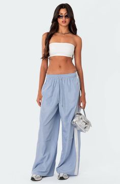 Find EDIKTED Fauna Track Pants on Editorialist. Sporty stripes trail the sides of these wide-leg track pants topped with a comfortable elastic waist. 100% polyester Machine wash, dry flat Imported Track Pants, Elastic Waist, Wide Leg, Light Blue, Track, Top Brands, Stripes, Elastic, Luxury Fashion