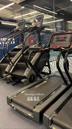 there are many treadmills in the gym and one is on display for everyone to see