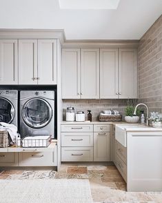 a washer and dryer sitting in a kitchen