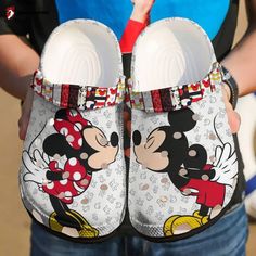 Introducing the Croc Shoes - Clog Shoes Mickey and Minnie mouse, the perfect footwear for all Disney enthusiasts! These adorable clog shoes feature the iconic Mickey and Minnie mouse designs, adding a touch of magic to your everyday style. Crafted with high-quality, lightweight Croslite material, these shoes offer superior comfort and durability. The breathable and water-friendly construction ensures all-day freshness and easy cleaning, making them ideal for any adventure. The adjustable ... Couple Crocs, Mickey Mouse Couple, Disney Crocs, Minnie Mouse Shoes, Flip Flop Wreaths, Crocband Clog, Crocs Fashion, Crocs Clog, Crocs Crocband