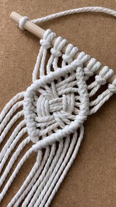 a close up of a piece of rope on the ground