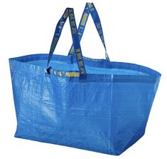 a blue shopping bag with handles and straps on the handle is shown in front of a white background