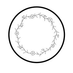 a black and white drawing of a circle with flowers