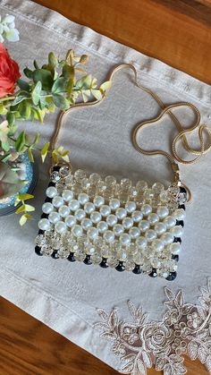 Square Beaded Bag For Gifts, Rectangular Bags With Pearl Handle For Gift, Square Beaded Shoulder Bag For Gifts, Chic Rectangular Clutch With Pearl Embroidery, Glamorous Pearl Embellished Rectangular Evening Bag, Handheld Box Bag With Pearl Handle As Gift, Handheld Box Bag With Pearl Handle For Gifts, Handheld Box Bag With Pearl Handle, Square Bags With Pearl Handle As Gift