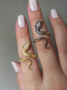 Dainty gold wraping snake ring made in 14k gold filled sterling silver. 14K gold snake ring adjustable ring, Elegant and Simple Designs for Everyday Wear, Uniq Designs, Mystical and Elegant Look, Gift for Her. Valentines day gift for girlfriend and boyfriend. Special and Meaningful Gift: Gift your loved ones the beauty of nature and the symbol of freedom! Snake shaped rings are a perfect choice to make special occasions or an ordinary day extraordinary. Comes in jewelry box ready to gift.  All o Spiral Snake, Snake Ring Gold, Silver Snake Ring, Symbol Of Freedom, Snake Ring Silver, Symbols Of Freedom, Ring Elegant, Snake Ring, Gold Snake