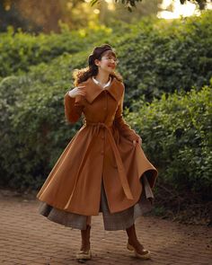 "❤❤This brown fit and flare coat that is simply elegant and will be an everlasting addition to your outerwear lineup. ★★FEATURES 50% wool, 50% fiber and nylon Fully liner with polyester Two side Seam pockets Bigger collar Long sleeve Single Button front Closure Fit and Flare  Below knee length Perfect for Winter, Autumn Dry clean Fabric swatch https://etsy.me/3yP53Zi ★★ Mode size Height approx 170 cm (5′ 7″)  Bust 84 cm (33\") bust Waist 66 cm (26\") She wears size XS. ★★ Custom order selection, Frock Coat Women Outfit, Cottagecore Winter Coat, Women’s Winter Coat, Victorian Coat Women, Winter Princess Outfit, British Fashion Classic, 1950s Winter Fashion, Vintage Coat Outfit, Vintage Coats For Women