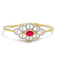 Make a statement with our Elegant Floral Diamond Bangle Bracelet. Crafted with 18k yellow gold and weighing 10.2 grams, this exquisite piece features 0.88ct F-G VS round brilliant-cut diamonds and oval-shaped cultured rubies. The adjustable 1.2" links and lobster lock ensure a comfortable fit. Let this stunning bangle take center stage in your jewelry collection. PRODUCT DETAILS Gold Purity(karat): 18k Item Weight(grams): 10.2 Item Finish: Yellow Gold Stone: Diamond Diamond Weight(carats): 0.88c Oval Diamond Bangle In Fine Jewelry Style, Oval Diamond Bangle For Anniversary, Oval Wedding Bracelet With Single Cut Diamonds, Oval Diamond Bangle With Single Cut Diamonds, Oval Diamond Gold Bracelet With Jubilee Design, Exquisite Hand Set Oval Bracelets, Exquisite Oval Diamond Bracelet, Wedding Diamond Gold Bracelet With Oval Shape, Wedding Gold Bracelet With Oval Diamond