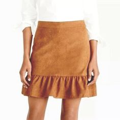 Nwot Excellent Condition, No Flaws! Us Women’s Size 2 J Crew Tan Faux Suede Skirt With Frill Hemline J. Crew Faux-Suede Ruffled Mini Skirt In Warm Carmel Brown J. Crew Style K2161 Ultra Soft And Smooth Suede Fabric Golden Brown Color Ruffle Trim Along Bottom Hem Mermaid Style Mini Sits At Waist Length: Approximately 16” Falls Above Knee Concealed Back Zip Closure Fully Lined Material: 100% Polyester Dry Clean. Classic, Chic, And Versatile Skirt Perfect For Any Occasion From Office Work To Partie Fall Ruffled Skirt For Workwear, Fall Workwear Ruffled Skirt, Brown Tiered Skirt For Fall, Brown Tiered Skirt Bottoms For Fall, Fitted Brown Flared Mini Skirt, Fitted Flared Brown Mini Skirt, Brown Ruffled Skirted Bottoms, Brown Ruffled Skirt Bottoms, Brown Skirted Bottoms With Ruffled Detail