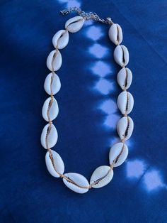 Hɑաɑííɑղ COWRIE shell choker * seashell necklace * unisex jewelry * beach choker * sմɾƒ girl * surf ցմվ * I will make your necklace today order. I will make it a standard length and add a chain so you can adjust it unless we otherwise agree on a length. Cheap Silver Shell Necklace, Beachy Choker Necklaces For The Beach, Cowrie Shell Necklace For Vacation, Natural Cowrie Shell Necklaces For Beach, Natural Color Cowrie Shell Necklaces For The Beach, Adjustable Shell-shaped Necklace For Beach Season, Cowrie Shell Strand Necklace For The Beach, Cowrie Shell Necklace For Beach, Beach Cowrie Shell Strand Necklace