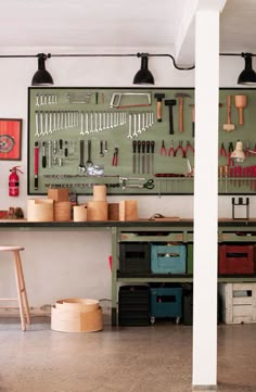 a workbench filled with lots of tools