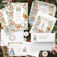 some cards and envelopes that have been decorated with images of peter the rabbit on them