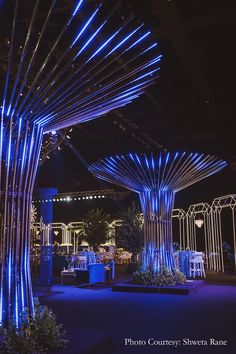 Larger-than-life with stunning LED installations and a retro vibe, this couple’s sangeet set the bar high with its elegance and glamour Event Set Up Ideas, Sangeet Theme Ideas, Black Theme Wedding, Event Stage Design, Unique Event Decor, Amazing Wedding Ideas, Sangeet Decor, Event Entrance, Forest Theme Wedding