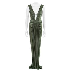 ▪ Roberto Cavalli 'Cleopatra' evening dress ▪ Fall-Winter 2007 ▪ Metallic green cupro jersey ▪ Finely pleated bodice ▪ Plunging v-neck with underwire bra detail ▪ Floor-length draped skirt with vertical pleats on the waistline ▪ Built-in corset and power-mesh body ▪ IT40 - FR36 - UK8 - US4 ▪ Made in Italy All photographs in this listing EXCLUDING any reference or runway imagery needs the credit of the copyright owner if you want to perform certain acts, such as copying the images or sharing them Green Draped Evening Dress, Luxury Green Sleeveless Evening Dress, Roberto Cavalli Dress, Draped Skirt, Pleated Bodice, Metallic Dress, Dress Suits, Roberto Cavalli, Fall Dresses