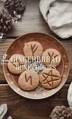 gingerbread buns on a plate with pine cones in the background and text overlay