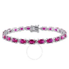 Elevate your look with this attractive tennis bracelet features oval-cut created ruby stones crafted in sterling silver. This graceful jewelry is secured with a box clasp. Weighs 10.50g, length 18.5 cm. Ruby Bracelet, Bridesmaid Bracelet, Stone Crafts, Box Clasp, Ruby Stone, Tennis Bracelet, Elevate Your Look, Pink Heart, Oval Cut