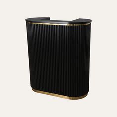 a black and gold trash can on a white background