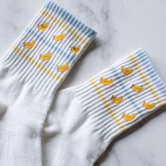 Adult Size 80% Cotton ,10% Spandex, 10%Polyester Machine Wash Introducing our Juicy Fruit Casual Socks, designed for comfort and style. These socks feature playful lines that add a pop of fun to any outfit. Made with quality materials, they offer a snug fit and long-lasting durability. Elevate your sock game with our Juicy Fruit Casual Socks. Sporty Yellow Cotton Socks, Fun Cotton Winter Socks, Fun Winter Cotton Socks, Novelty Cotton Socks For Winter, Novelty Cotton Winter Socks, Fun White Winter Socks, Winter Novelty Cotton Socks, Playful White Winter Socks, Fun White Summer Socks