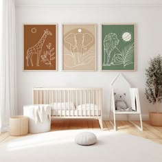 a baby's room with three posters on the wall