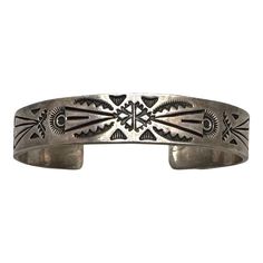 This is part of Chairish’s Costume Jewelry assortment.  Hopi sterling silver cuff bracelet by Lucian Koinva. This Hopi cuff bracelet is stamped with traditional Hopi motifs and contrasted with niello. It is hallmarked with the initials L K.  This cuff is in very good original condition with wear consistent with age and use.  Dimensions: 1.12” opening, 2.75” interior length, 2” interior depth, .5” height Chanel Cuff, Golden Rabbit, Gold Cuffs, Sterling Silver Cuff Bracelet, Sterling Silver Cuff, Silver Cuff Bracelet, Silver Cuff, Cuff Bracelet, Costume Jewelry