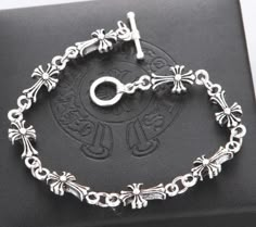 - Gothic Cross Design - 8 inches - Chrome Hearts Inspired Inspired by the iconic Chrome Hearts brand, this bracelet is a must-have accessory perfect for those who love to blend the gothic aesthetic with Christian symbolism fusing faith and fashion together This unisex design is made to fit most adults comfortably so you can wear it all day long without any discomfort. Chrome Hearts Bracelet, Metal Outfits, Midnight Society, Christian Symbolism, Chrome Hearts Jewelry, Metal Outfit, Be On Time, Dope Jewelry Accessories, Gothic Jewellery