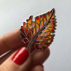 Leaf Brooch Hoja - Stained Glass Jewelry - Silver Brooch - Marcasite Jewelry - Leaf Jewelry - Orange Brooch - Red Brooch - Gift for Mom Sterling Silver 830, marcasite, stained glass enamel Weight: 6,6 g Dimensions: 4,7 cm x 3,3 cm (1.85 x 1.3 inches) Art.: M-36081 Made in Spain For more MOSA designs, please, visit my online store at www.BestSpanishShop.com Red Enamel Brooch Pin, Red Enamel Brooch, Red Enamel Brooch Jewelry, Red Enamel Brooch Gift, Red Enamel Brooch For Gift, Red Enamel Brooches As Gift, Red Enamel Brooches For Gift, Red Brooch, Marcasite Jewelry