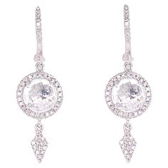 These diamond dangle earrings are super versatile, from jeans to dressy or even for your wedding earrings! Each earring is made in 3 parts so it has movement as your head and body move. This glorious feature makes it our number one diamond earrings for 2021/2022. Earrings: 1 Set Metal Quality: 14 Karat White Gold Earring Type: Dangle Clasp Type: Lever-Back Earring Length: 1.25 inches Halo width: 9.20 millimeters Diamond Number: 65 Diamond Shape: Round Total Diamond Weight: .25 Carat Gemstone: White Topaz Gemstone Shape: Round Gemstone Number: 2 Average Gemstone Diameter: 6.53 millimeters Gemstone Weight: 2.50 Carat Total Weight: 2.75 Carat total weight Wedding Earrings In Brilliant Cut White Topaz, Wedding Earrings With Brilliant Cut White Topaz, Elegant White Topaz Diamond Earrings For Wedding, Luxury White Topaz Wedding Earrings, Elegant White Topaz Earrings With Diamond Cut, White Topaz Drop Earrings For Wedding, Wedding Earrings With Diamond Accents And White Topaz, Rose Cut Diamond Dangle Earrings, 2022 Earrings