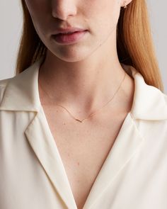 Your wish come true! The 14K Gold Wishbone Necklace is perfect to stack but striking enough to wear on it's own. Dainty, delicate, and simply dazzling.  | Quince | Women's 14K Gold Wishbone Necklace in Yellow Gold Wishbone Necklace Gold, Wishbone Necklace, Wish Come True, Sell Gold, Mink Pink, Back To Black, Black Charcoal, Quince, Cloth Bags