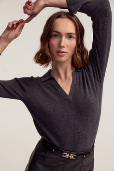 A sweater silhouette designed for versatility and enduring style. Featuring a classic collar with a V-neck for a touch of femininity, this sweater offers both comfort and sophistication. With its long sleeves and a ribbed knit texture, the sweater is ideal for all types of weather and perfect for layering. It's a wardrobe essential that effortlessly transitions from season to season. Product DetailsModel 5'10" wearing a size SMaterials: 90% Wool 10% CashmereCare: Dry Clean Only Types Of Weather, Fur Accessories, Knit Texture, Scarf Belt, Knit Blazer, Polo Sweater, Scarf Jewelry, Silhouette Design, Denim Pant