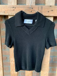 Dolce and Gabbana vintage polo shirt, fish net, see through dense knit work, network, very very elastic, super stretchable Black viscose size 44 eu Mint condition, NOS, never worn PLEASE NOTE Vintage item, slight wear is expected please carefully look and zoom pictures and read description till the end All sales are final, returns or exchange accepted if the item is grossly misrepresented any single flaws or faults is shown and reported so please scan all the information of listing and read shop Knit Fishnet, Vintage Briefcase, Vintage Polo Shirt, Fish Net, Eyewear Womens, Till The End, Vintage Polo, Chunky Knit, Mint Condition