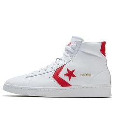 The Converse Pro Leather Mid sneaker returns in its original colorway in this 'Then & Now' edition, released in October 2019. The sneaker is constructed of a white leather upper, styled with a red Star Chevron logo and branded heel tab. Golden lettering spells out the icon's name on the quarter panel. A classic rubber cupsole with a signature herringbone tread pattern adds an authentic finish to this classic sneaker. First released in 1976, the Converse Pro Leather Mid is a true icon of the basketball world, and this 'Then & Now' edition celebrates that iconic heritage. (SNKR/Skate/Casual/Unisex/High Top) Chevron Logo, Converse Pro Leather, Leather Converse, Red Star, Classic Sneakers, White Leather, Herringbone, Then And Now, High Tops