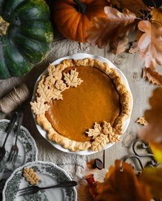 a pumpkin pie sitting on top of a table