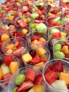 many cups filled with different types of fruit